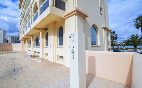 Saladar: Sky, Property, Cloud, Building, Window, Azure, Wood, Shade, Condominium, Urban Design