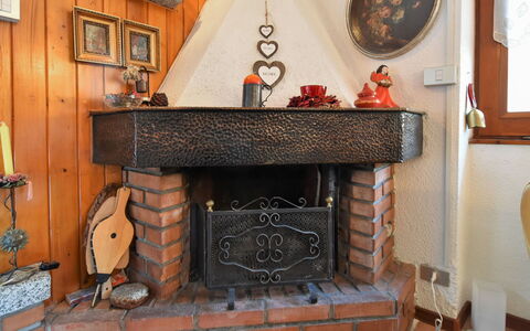 Villa Lucia: Property, Picture Frame, Building, Wood, Hearth, Orange, Interior Design, Window, Living Room, Floor