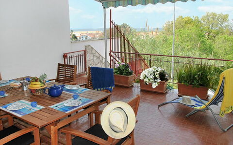 Francesca: Table, Plant, Sky, Furniture, Flowerpot, Chair, Building, Azure, Outdoor Furniture, Outdoor Table