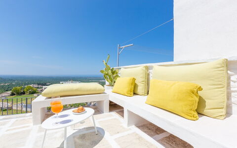 Romeo e Giulietta - Terrazza Vista Mare: Sky, Property, Plant, Comfort, Outdoor Furniture, Interior Design, Shade, Water, Couch, Pillow