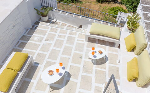 Romeo e Giulietta - Terrazza Vista Mare: Plant, Interior Design, Urban Design, Yellow, Building, Flooring, Floor, Chair, Wood, Real Estate