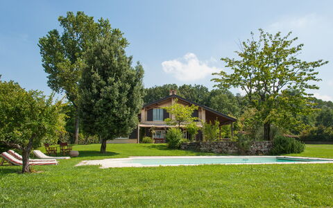Villa Monia: Plant, Cloud, Sky, Building, Natural Landscape, Tree, Land Lot, Architecture, Cottage, House