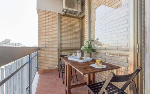 Cattolica Sea Loft: Table, Furniture, Property, Building, Flowerpot, Wood, Chair, Kitchen, Brick, Plant
