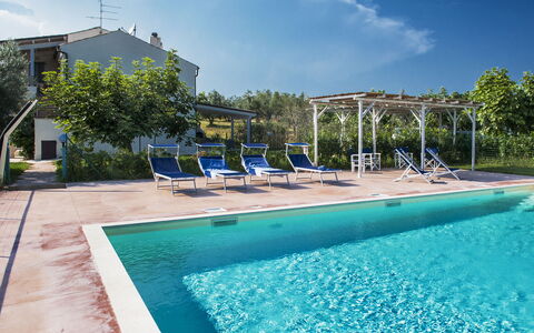 Villa Degli Aranci: Water, Cloud, Plant, Sky, Property, Swimming Pool, Azure, Tree, Shade, Building