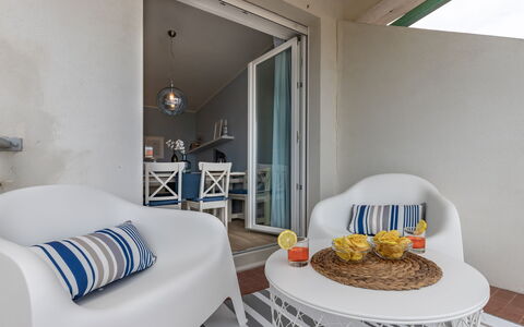 Conero Suite: Furniture, Property, Comfort, Product, Azure, Textile, Wood, Lighting, Building, Orange