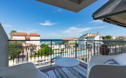 Conero Suite: Sky, Building, Furniture, Daytime, Property, Cloud, Chair, Azure, Blue, Shade
