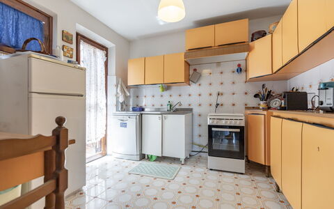Villa Il Pesco: Cabinetry, Furniture, Property, Countertop, Kitchen Appliance, Kitchen, Kitchen Stove, Interior Design, Lighting, Refrigerator