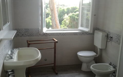 Giannella Holiday Apartment: Plumbing Fixture, Property, Window, Sink, Tap, Bathroom Sink, Bathroom, Purple, Building