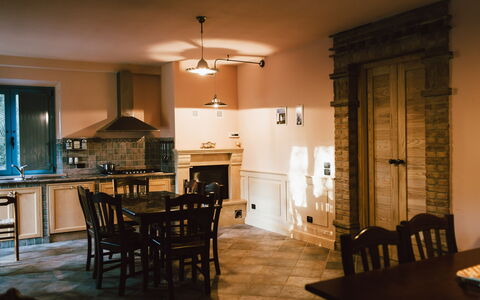 Villa Millefiori: Table, Furniture, Chair, Kitchen, Wood, Lighting, Countertop, Living Room, Window, Flooring