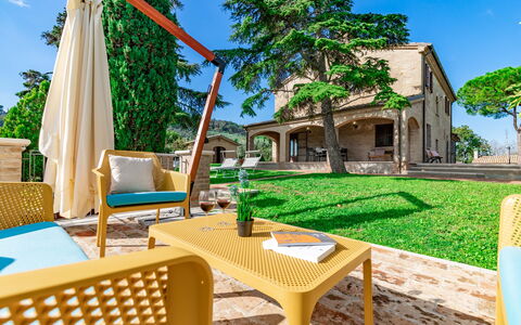 Villa Vagnini: Sky, Property, Furniture, Building, Table, Nature, Green, Wood, Azure, Outdoor Furniture