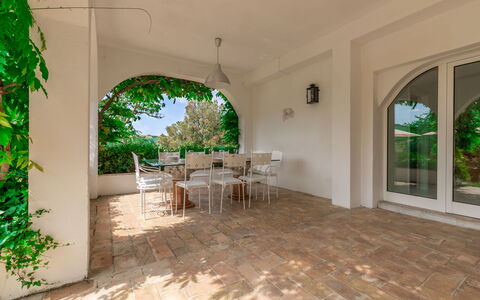 Villa La Picena: Furniture, Plant, Table, Chair, Building, Shade, Wood, Interior Design, Hall, Floor
