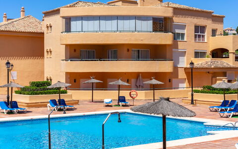 Los Patios de Santa Maria: Water, Sky, Property, Plant, Building, Cloud, Swimming Pool, Tree, Residential Area, Grass