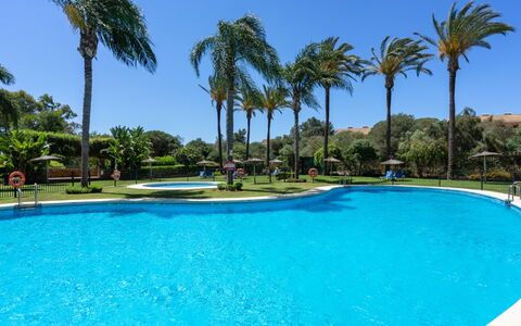 Los Patios de Santa Maria: Water, Sky, Property, Plant, Building, Cloud, Swimming Pool, Tree, Residential Area, Grass
