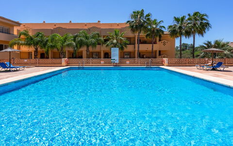 Los Patios de Santa Maria: Water, Sky, Property, Plant, Building, Cloud, Swimming Pool, Tree, Residential Area, Grass