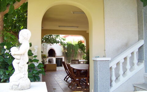 Villa Mar: Plant, Building, Shade, Interior Design, Tree, Chair, House, Column, Door, Arch