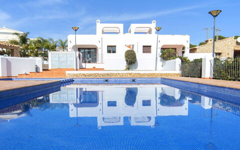 Mirador de les Bassetes: Water, Sky, Plant, Cloud, Property, Swimming Pool, Building, Azure, House, Shade