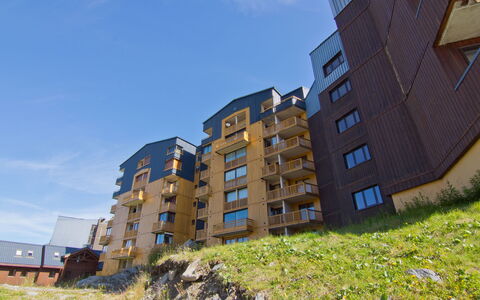 Val Thorens 250: Sky, Cloud, Building, Plant, Window, Tower Block, Urban Design, Vegetation, Condominium, Grass