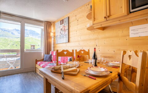 Val Thorens 350: Table, Tableware, Furniture, Property, Cabinetry, Building, Chair, Food, Wood, Interior Design