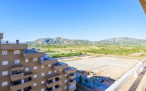 Jardines del Mar Ii - Marina D'Or: Sky, Building, Mountain, Azure, Wood, Body Of Water, Urban Design, Window, Real Estate, House