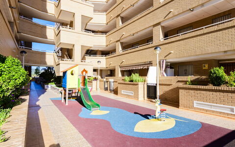Jardines del Mar Ii - Marina D'Or: Plant, Property, Architecture, Urban Design, Building, Neighbourhood, Residential Area, Line, Flooring, Leisure