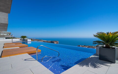 Blue Infinity 1: Water, Sky, Building, Seaside Resort, Swimming Pool, Outdoor Furniture, Shade, Condominium, Plant, Sunlounger