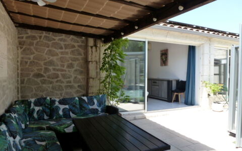 Logis de la Castagne: Furniture, Floor, Flooring, Chair, Outdoor Furniture, Shade, Door, Flowerpot, Porch, Houseplant