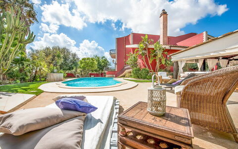 Villa Rossana: Cloud, Sky, Water, Plant, Building, Daytime, Property, Azure, Swimming Pool, Outdoor Furniture