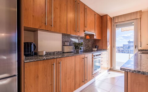 Deltamar: Kitchen, Flooring, Major Appliance, Wood, Countertop, Cabinetry, Kitchen Appliance, Floor, Interior Design, Apartment
