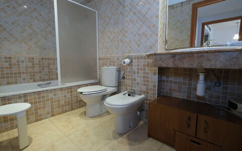 Golden Beach: Plumbing Fixture, Mirror, Building, Bathroom Sink, Toilet Seat, Bathroom, Tap, Purple, Interior Design, Toilet