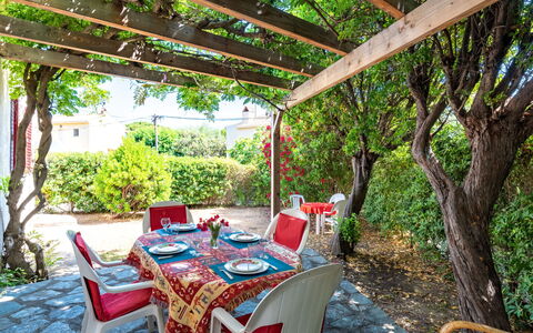 Villa Irène: Plant, Furniture, Property, Table, Botany, Nature, Chair, Outdoor Furniture, Shade, Interior Design