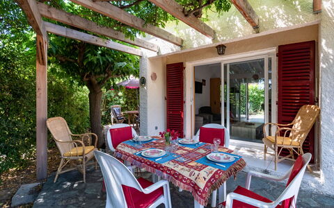 Villa Irène: Table, Furniture, Building, Plant, Property, Chair, Outdoor Table, Outdoor Furniture, Interior Design, Shade
