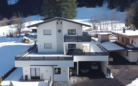 Haus Goldmann: Property, Sky, Table, Wood, Shade, Floor, Outdoor Furniture, Chair, Flooring, Wood Stain