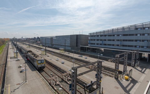 Railway to the Beach with Balcony: Sky, Plant, Building, Property, Window, Tree, Slope, Land Lot, House, Urban Design