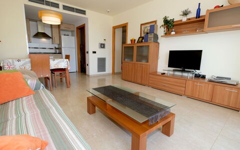 Golden Beach: Furniture, Table, Wood, Building, Interior Design, Television, Floor, Flooring, Living Room, Hardwood