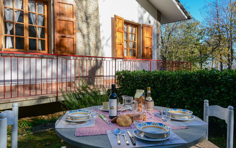 Vittoria: Table, Furniture, Building, Property, Window, Tableware, Plant, Chair, Azure, Outdoor Furniture
