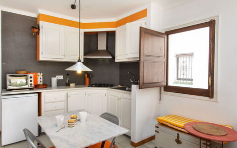 Edifici Port del Rei: Plant, Water, Property, Furniture, Building, Table, Window, Azure, Chair, Interior Design