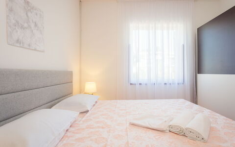 Maris: Plant, Water, Property, Furniture, Building, Table, Window, Azure, Chair, Interior Design