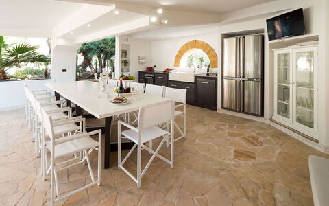 Villa Girgenti: Table, Furniture, Property, Cabinetry, Chair, Countertop, Wood, Interior Design, Flooring, Floor