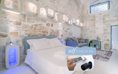 Porta San Demetrio Junior Suite 4: Property, Furniture, Couch, Comfort, Azure, Interior Design, Picture Frame, Floor, Pillow, Studio Couch
