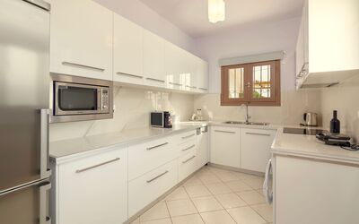 Kalpaki Iv: Cabinetry, Property, Countertop, Building, Tap, Sink, Drawer, Kitchen Appliance, Kitchen, Wood