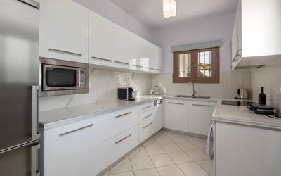 Kalpaki Ii: Cabinetry, Countertop, Property, Building, Drawer, Kitchen, Kitchen Appliance, Wood, Interior Design, Sink
