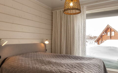 Haltinmalla: Wood, Interior Design, Ceiling, Flooring, Floor, Bedroom, Light Fixture, Lighting, Room, Bed
