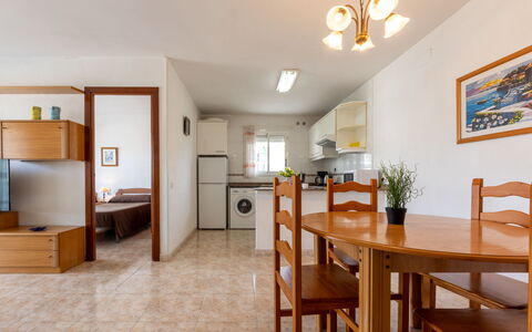 Living Park: Table, Furniture, Cabinetry, Chair, Wood, Interior Design, Floor, Picture Frame, Houseplant, Living Room