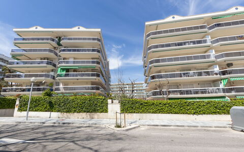 Living Park: Cloud, Building, Sky, Daytime, Property, Plant, Architecture, Urban Design, Shade, Real Estate