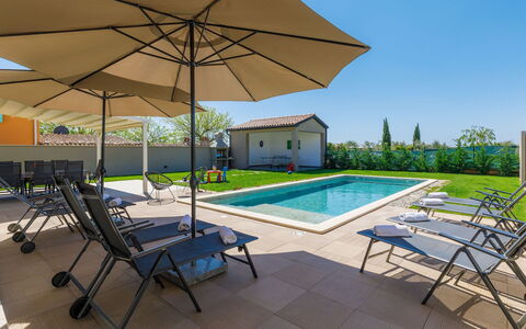 Villa Edi: Water, Plant, Property, Swimming Pool, Furniture, Building, Sky, Table, Umbrella, Azure