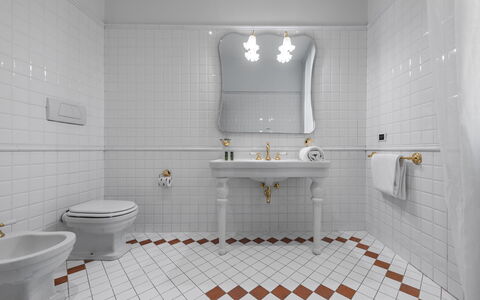 Le Due Ville: Plumbing Fixture, Tap, Property, Mirror, Bathroom Sink, Toilet, Building, Toilet Seat, Bathroom, Purple