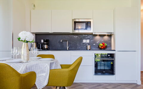Nouvelle Vague: Cabinetry, Furniture, Countertop, Table, Chair, Interior Design, Kitchen, Floor, Kitchen Appliance, Flooring
