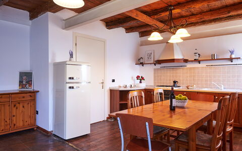 Bellano 14: Furniture, Cabinetry, Property, Table, Wood, Chair, Architecture, Interior Design, Kitchen, Tableware