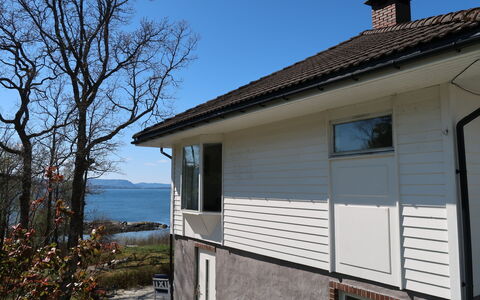 Villa Hjartnes: Sky, Building, Plant, Property, Window, Wood, House, Tree, Architecture, Shade