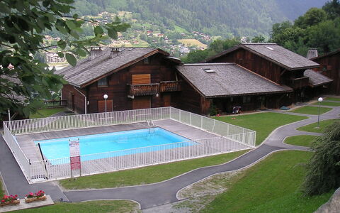 Saint Gervais 15: Building, Swimming Pool, Plant, Mountain, Tree, Shade, Grass, Leisure, Landscape, House